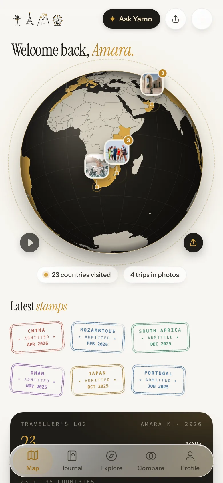 The Yamo home screen: a globe with visited countries in gold, photo pins and passport stamps